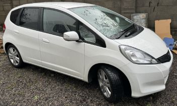 A 2014 Honda Jazz + I-VTEC CVT Hatchback, registration number CN14 WEU in white, 1339cc, automatic,