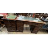 A reproduction mahogany pedestal desk,