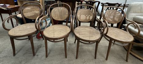 A set of four Polish Dinette bentwood elbow chairs with caned back and seat,