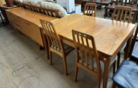 A mid-20th century Beithcraft teak dining suite comprising an extending dining table,