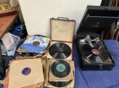 An HMV table top Gramophone and records