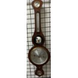 A Comitti of Holborn mahogany framed banjo barometer with a hydrometer, alcohol thermometer,