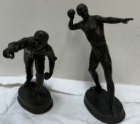 A bronzed spelter figure of a sportsman bowling a ball together with another of a sportsman about