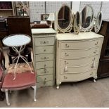 A cream painted five drawer chest together with a tall painted chest of drawers two tryptych