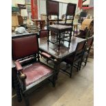 A 19th century carved oak dining suite comprising an extending dining table with two leaves and