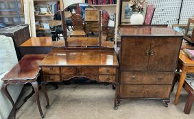 A 20th century walnut tallboy and matching dressing table and a mahogany occasional table