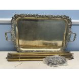 A large electroplated twin handled tray together with brass stair rods and clips
