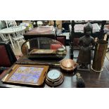 An oval wall mirror together with a butterfly wing tray, barometer, shell case,
