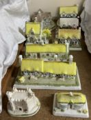 A Coalport porcelain model of The Village shop together with other Coalport cottages including The