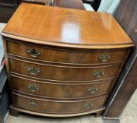 A reproduction mahogany chest with a D shaped top and four long drawers on bracket feet