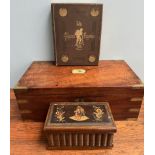 A 19th century inlaid puzzle box in the form of a bookshelf together with a mahogany laptop desk