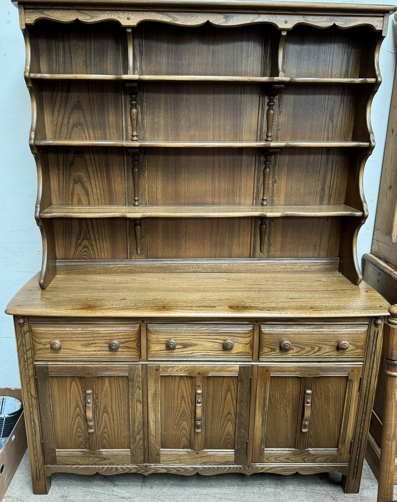 An Ercol dining suite comprising an extending dining table, - Image 2 of 3