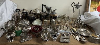 Assorted electroplated items including teapots, sugar bowls, egg cups,