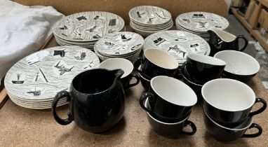 A Homemaker part tea and dinner service including tea cups and saucers, dinner plates, cereal bowls,