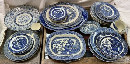A Japanese porcelain blue and white plate together with assorted blue and white pottery plates etc