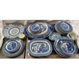 A Japanese porcelain blue and white plate together with assorted blue and white pottery plates etc