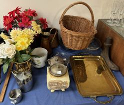 A brass twin handled tray together with a copper jug, copper jardinieres, biscuit barrel, basket,