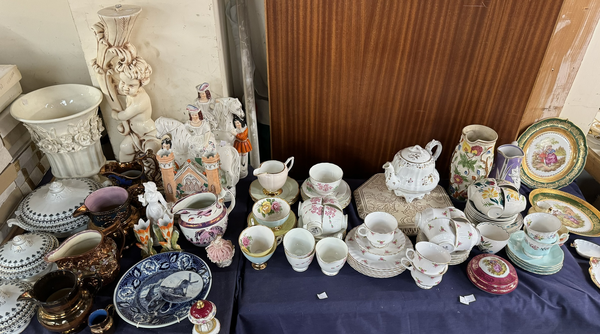 A pair of Staffordshire figures of Ladies on horseback, copper lustre jugs, part dinner set,