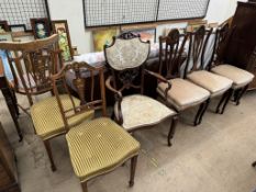 A set of three Edwardian mahogany salon chairs together with an Edwardian elbow chairs and a pair