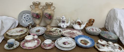 ***Unfortunately this lot has been withdrawn from sale*** A pair of floral painted twin handled