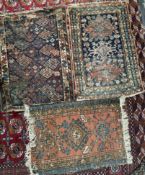 A rug with a blue ground with multiple diamond medallions and multiple guard stripes,