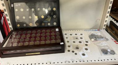 A collection of 20th century Britannia pennies, cased together with Coins of the realm, cased,