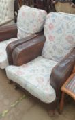 A pair of leather club chairs
