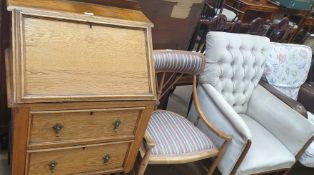 An oak bureau together with a bedroom chair and an upholstered Edwardian elbow chair