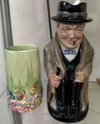 A Clarice Cliff moulded vase together with a Royal Doulton Winston Churchill toby jug