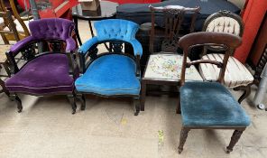 A pair of ebonised upholstered horseshoe shaped chairs together with a Regency mahogany dining