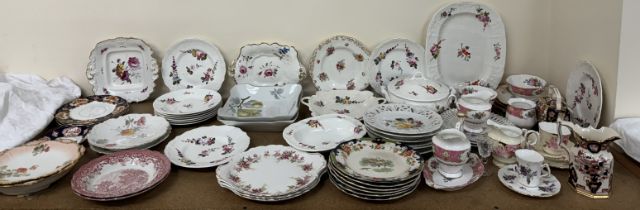 A collection of 19th century floral painted plates and dishes together with ribbon plates,