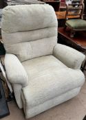 A green upholstered electric chair