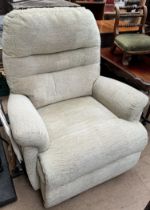 A green upholstered electric chair