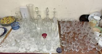 A crystal camel together with glass decanters, drinking glasses,
