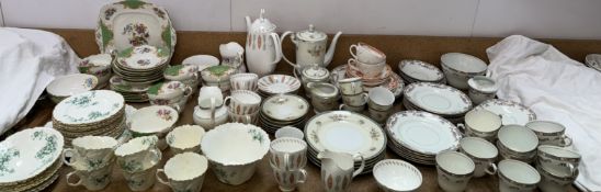 A Paragon floral decorated part tea service together with a Meir China part tea service,