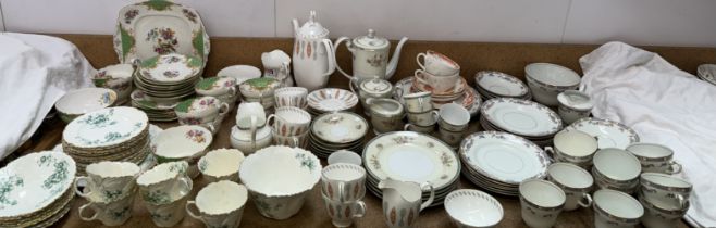 A Paragon floral decorated part tea service together with a Meir China part tea service,