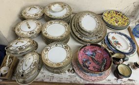 A Noritake part dinner service together with a Maling pottery bowl, pottery plates,