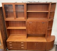 A mid 20th century teak G-Plan three piece wall unit