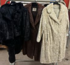 A Dickins Jones fur coat together with two other fur coats