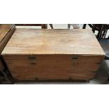 A camphor wood coffer of rectangular form with recessed handles and brass corners 104cm long x 51cm