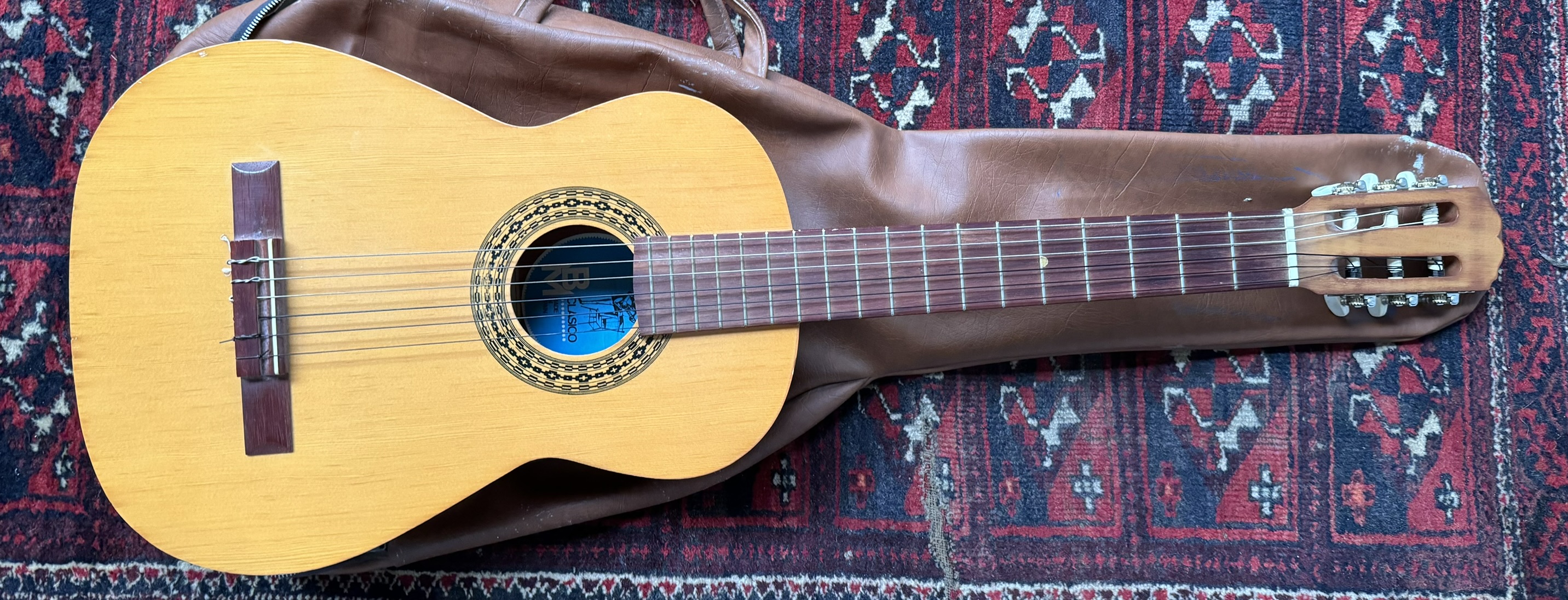 A BM Classico Spanish acoustic guitar and case