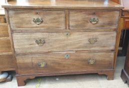 A 19th century mahogany chest with a rectangular top above two short drawers and two long drawers