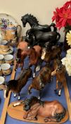 A collection of Beswick & Royal Doulton horses