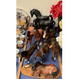 A collection of Beswick & Royal Doulton horses