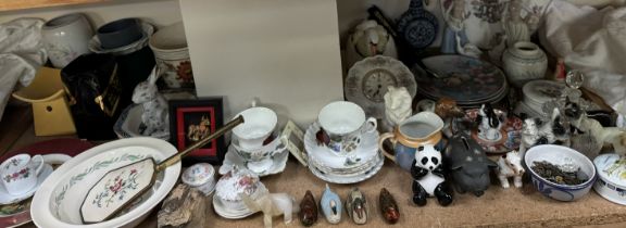 Pottery figures together with collectors plates, dog figures, water jugs,
