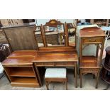 A modern yew dressing table together with a pair of yew bedside cabinets,
