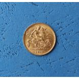 A George V gold half sovereign,