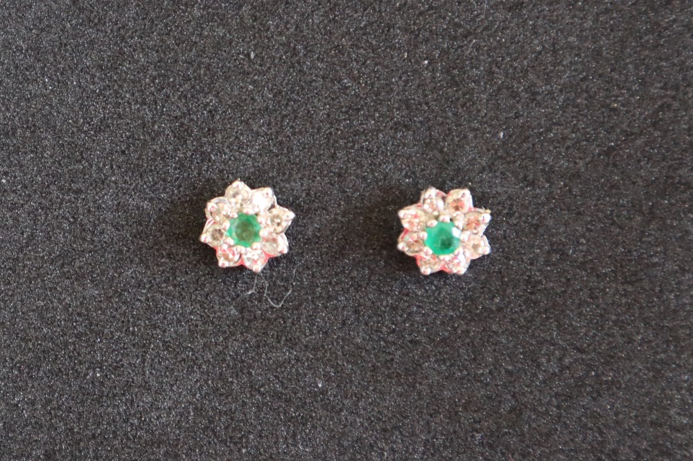 A pair of emerald and diamond stud cluster earrings,