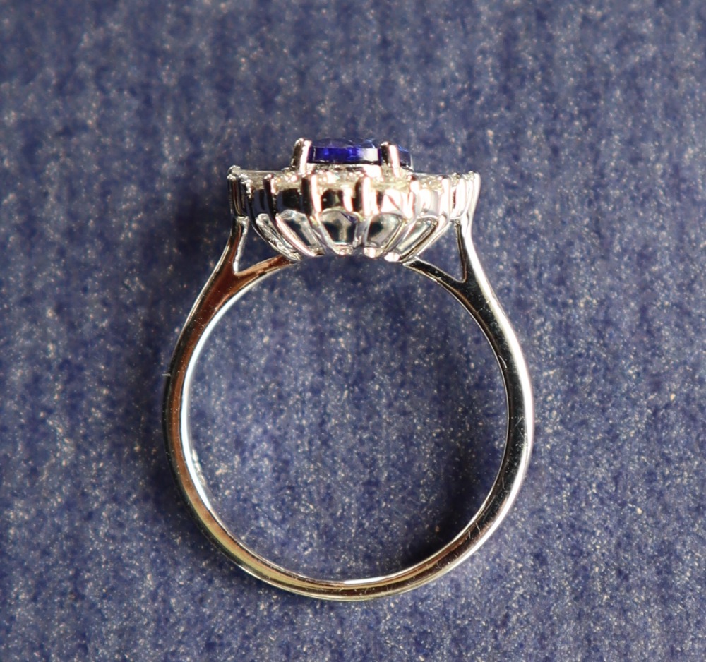 A tanzanite and diamond cluster ring, the central oval faceted tanzanite approximately 1.54ct. - Image 4 of 5