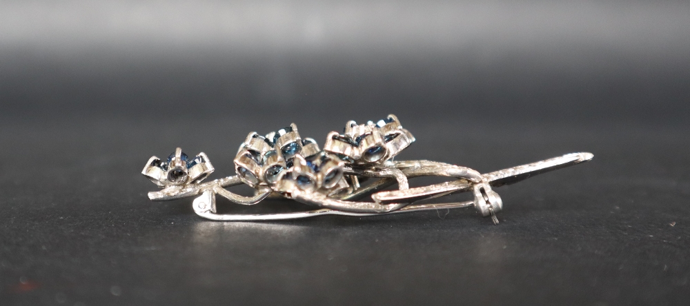A sapphire and diamond brooch, of floral design, - Bild 6 aus 6